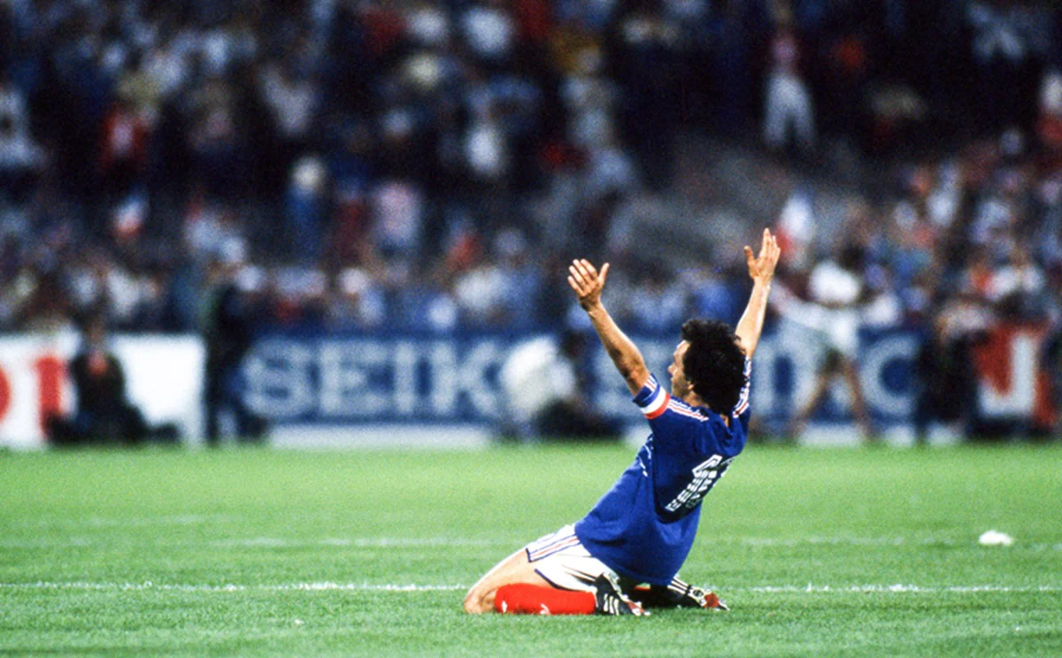Michel Platini celebrates his goal in the final seconds of extra time as his team made it to the EURO 1984 semis
