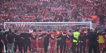 Reds Crowned Champions After Thrashing Spurs