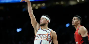Reports: Booker Commits Long-Term to Suns Amidst Offseason Shake-Up