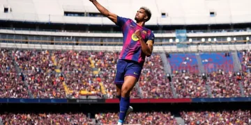 Barcelona Cling on to Beat Rayo