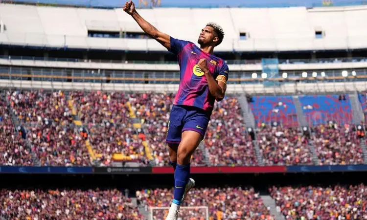 Barcelona Cling on to Beat Rayo